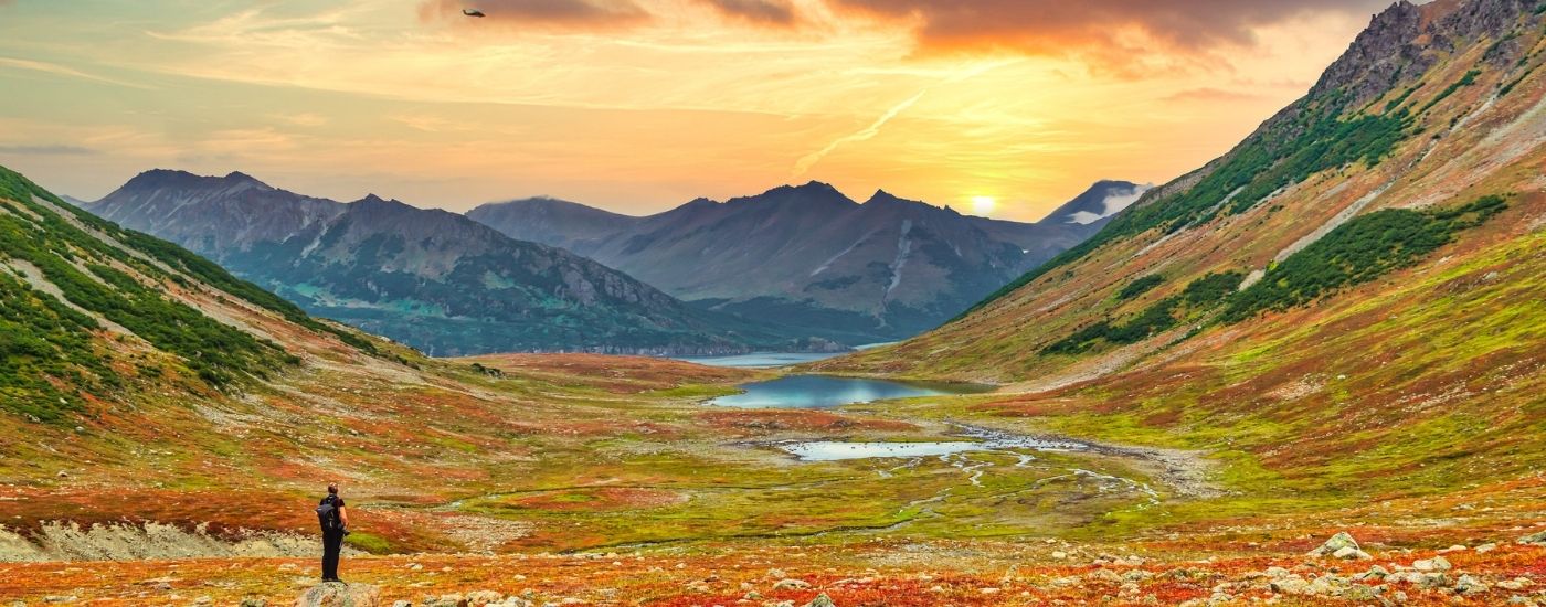 Kamchatka tour traveller admiring the stunning scenery.