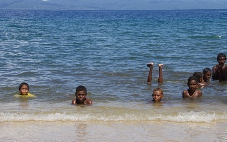 Children Enjoying a Swim on Ugi Island