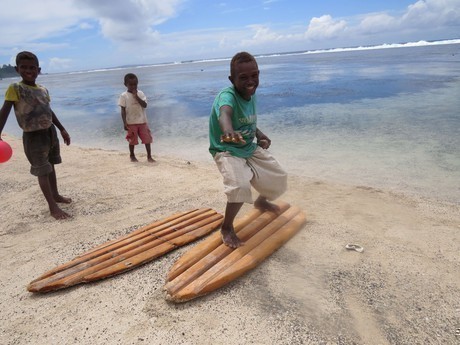 Surfing Makira's south coast